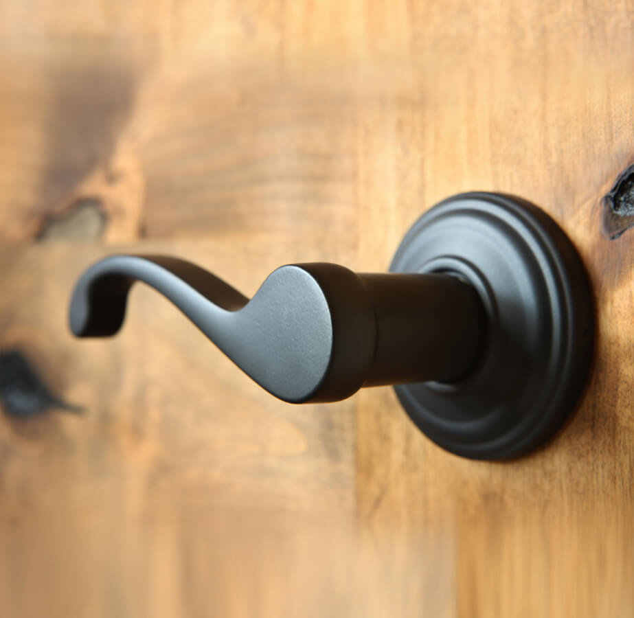 Wood door and metal door handle